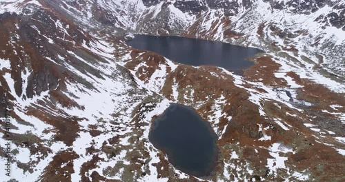 High altitude aerial drone shot of Satania dolinka hiking area and Hincovo pleso lakes in High Tatras mountains photo