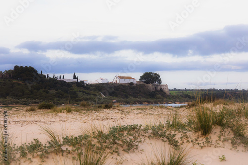 Picturesque portuguese beach of Cacela Velha, Algarve - Portugal. Beautiful wild beach photo