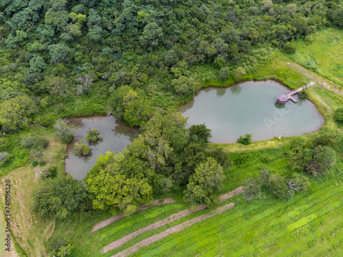 vista aerea desde un drone de un lago en un campo, La merced, catamarca, argentina photo