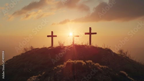 hill with the 3 crosses where Jesus Christ died at sunset with the sun in the background. concept holy week, jesus christ