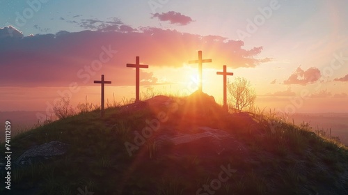 hill with the 3 crosses where Jesus Christ died at sunset with the sun in the background