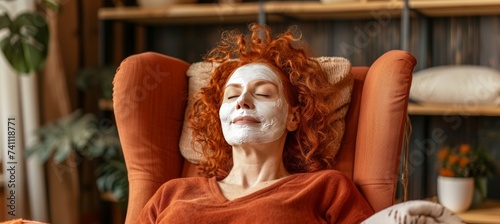 Senior woman relaxing with eyes closed, facial mask in spa conceptbeauty, wellness, mental health. photo