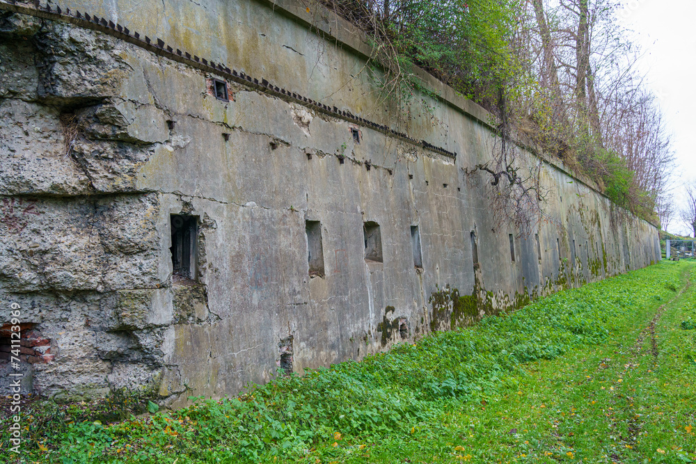 Naklejka premium Bolestraszyce, Subcarpathian, Poland - 25 November 2023: Fort GHW XIII San-Rideau, the northeastern part of the left wing caponier and a fragment of the shooting gallery in the moat's counter wall