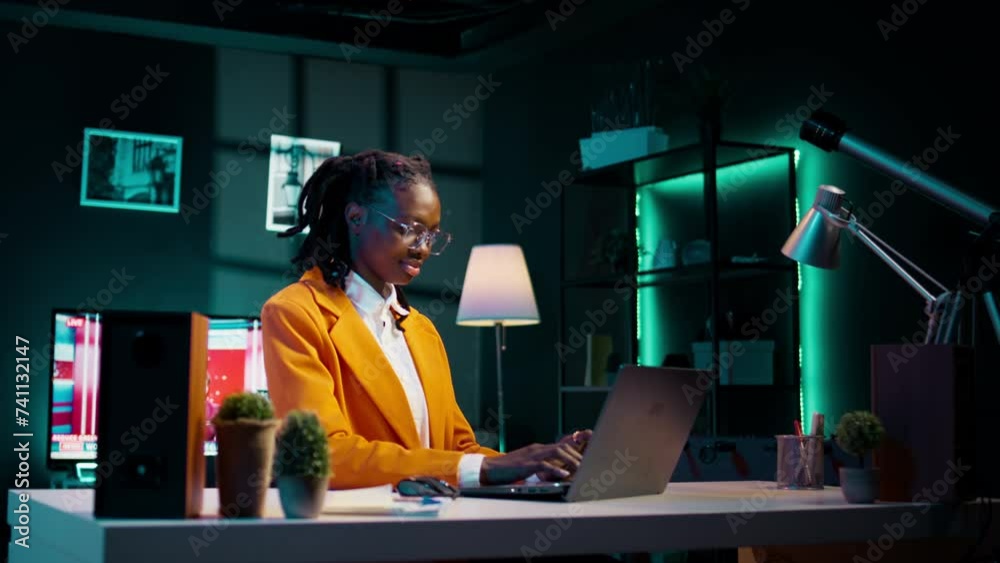 Hardworking girl studying business administration remotely, attending online classes and webinars on dedicated academic platform. College student researching for assignments and projects. Camera B.