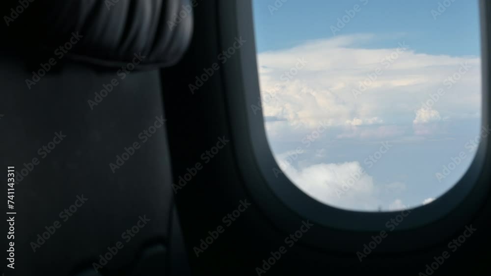 airplane flight flying trip travel above clear blue sky with beautiful cloud, looking at view through window of plane airplane flight flying trip travel above clear blue sky with beautiful cloud, looking at view through window of plane