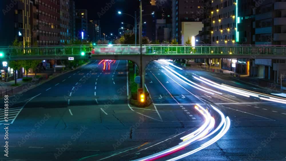 A night timelapse of traffic jam at the large crossing in Kyoto A night timelapse of traffic jam at the large crossing in Kyoto