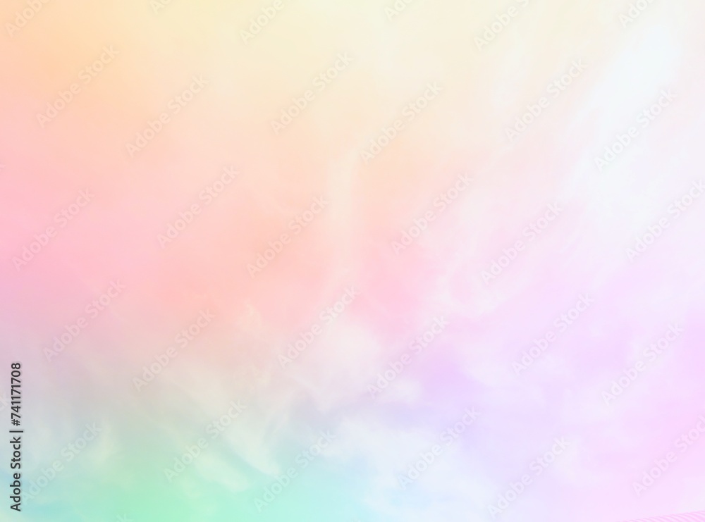 Pastel rainbow gradient background  Green, yellow, orange, pink and light purple.  The combination of subtle colors and the beauty of the smooth white clouds in the soft sky.