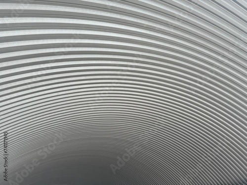 Large curved corrugated iron dome roof See a curve leading the eye as a pattern.