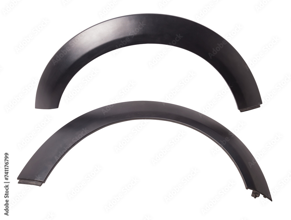 Black plastic fender flare on a white isolated background in a photo studio for sale or replacement in a car service. Mudguard on auto-parsing for repair or a device to protect the body from dirt. Black plastic fender flare on a white isolated background in a photo studio for sale or replacement in a car service. Mudguard on auto-parsing for repair or a device to protect the body from dirt.