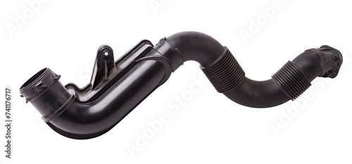 Air duct to the filter of intake manifold of the car engine from textured material and black plastic to condition the air and prevent dust from entering the passenger compartment. Sale of spare parts. photo