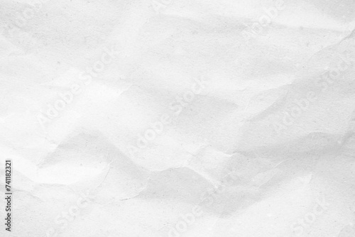 White recycled craft paper texture as background. Grey paper texture, Old vintage page or grunge vignette of old newspaper. Pattern rough art creased grunge letter. Hardboard with copy space for text.