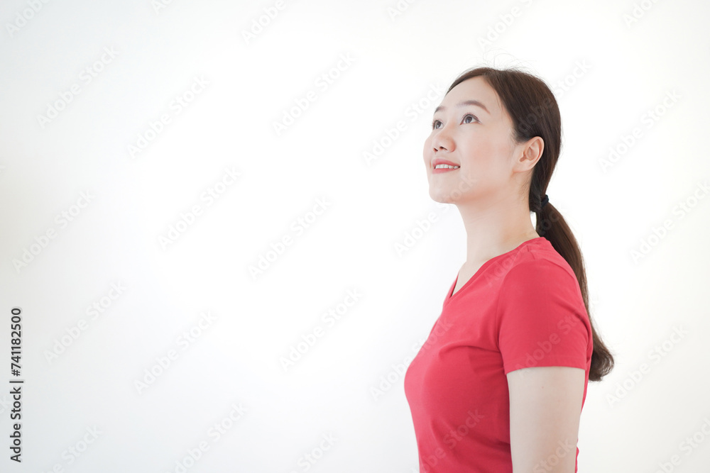 Smart and good looking Asian beautiful young woman in red t-shirt standing for portrait photography. Smart and good looking Asian beautiful young woman in red t-shirt standing for portrait photography.