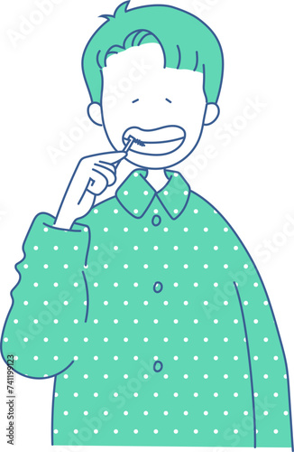 歯間ブラシをする男性