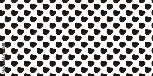 Seamless polka dot pattern: Vector illustration with small black freeform dots on a white backdrop. Creative texture of chaotic triangular and round shapes. Cute dotted wrapping paper sample.