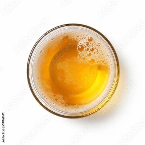 Top view of a glass of beer isolated on white background