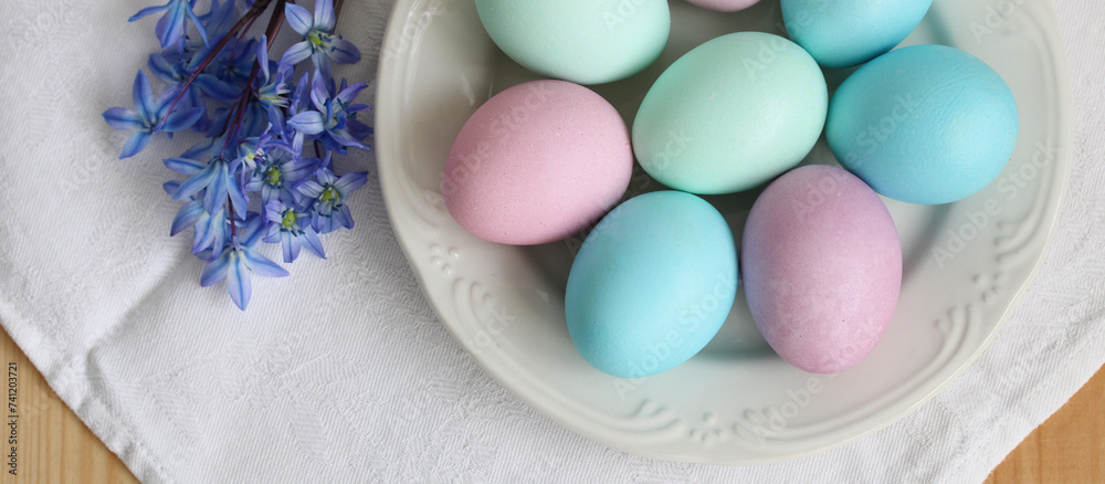 Easter concept, painted eggs in pastel colors. flat lay, top view. copy space. Easter concept, painted eggs in pastel colors. flat lay, top view. copy space.