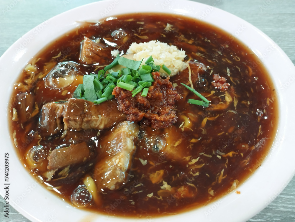 thick dark sauce of local noodle cuisine thick dark sauce of local noodle cuisine