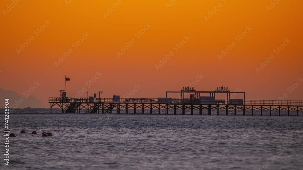 Time lapse sea and pier dock after sunset, golden hour Sharm El Sheikh Time lapse sea and pier dock after sunset, golden hour Sharm El Sheikh