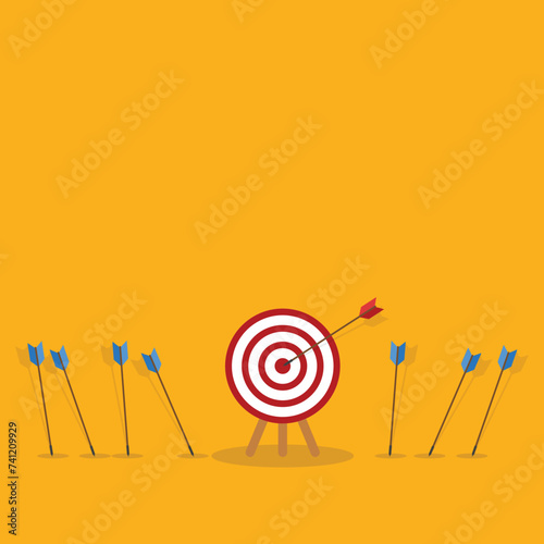 Business challenge failure and success concept. Blue arrows missed hitting target and only red one hits the center.	