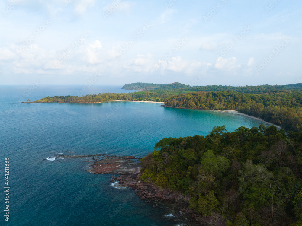 Aerial drone view of beautiful beach with turquoise sea water and palm trees of Gulf of Thailand. Kood island, Thailand. Aerial drone view of beautiful beach with turquoise sea water and palm trees of Gulf of Thailand. Kood island, Thailand.