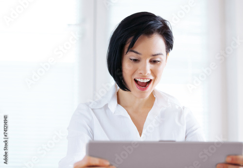 Business, excited and woman with laptop, celebration and happiness with good news, email and prize. Person, employee and professional with computer and success with giveaway or smile with achievement