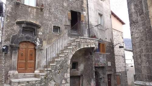 Scanno, Italy A panning shot of the piazza and old church, Chiesa di Santa Maria delle Grazie photo