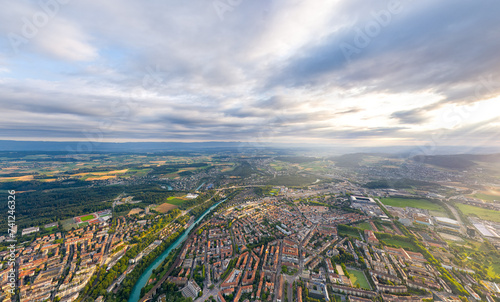 Bern  Switzerland. Panorama of the city in cloudy weather. Sun rays. Summer morning. Aerial view