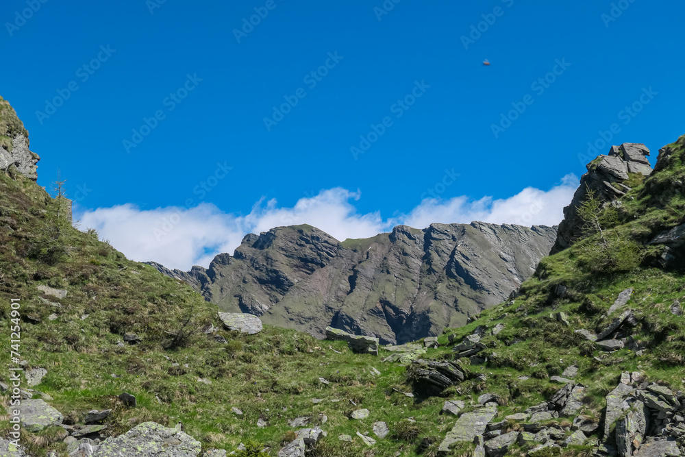 Panoramic view of unique mountain ridge Boese Nase in Ankogel Group, Carinthia, Austria. Idyllic hiking trail in remote Austrian Alps in summer. Looking at majestic rugged terrain of alpine landscape