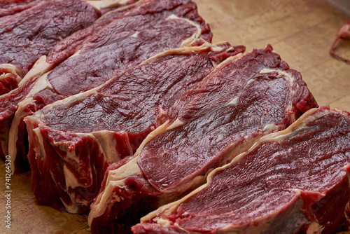 A fresh piece of beef steak on a cutting board