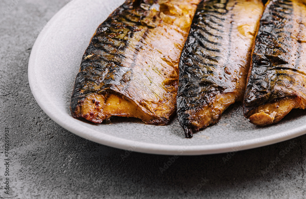deliciously roasted mackerel on a grill deliciously roasted mackerel on a grill