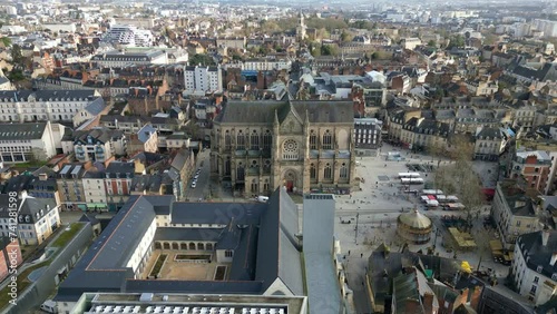 Basilica Saint-Aubin in Place Sainte Anne square and Jacobins convent, Rennes in France. Aerial drone circling photo