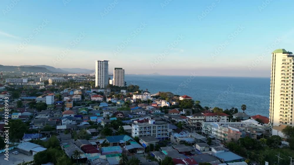 Top view of a city by the sea in Thailand, condominiums and private houses
