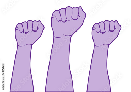 Puños morados levantados por el feminismo.