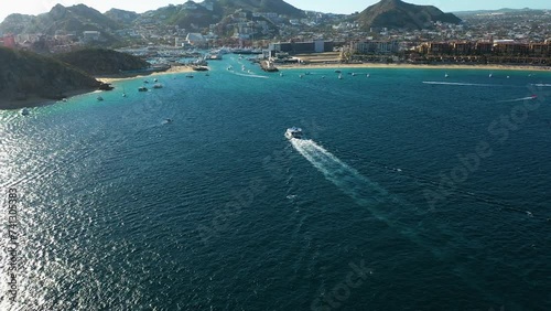 Aerial view approaching ferry arriving in Cabo San Lucas, sunny day in Mexico photo