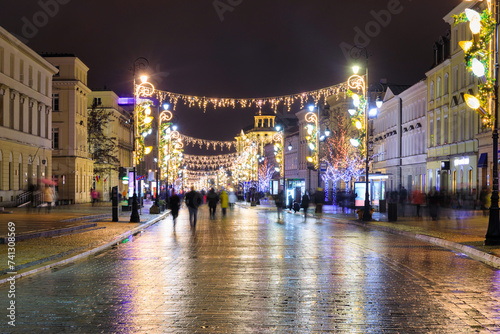 Beautiful architecture of the Royal Route with Christmas illuminations in Warsaw. Poland