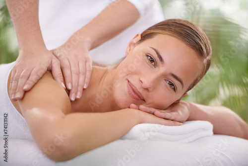 Spa, portrait and woman or hands with massage for relax, luxury treatment and happiness with towel. Person, face and masseuse for body care, pain relief and comfort with smile, wellness and skincare
