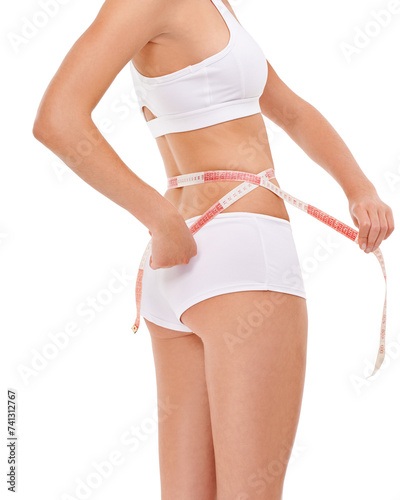 Female person, wellness and weight loss for health, fitness and studio for workout and body care with tape measure. Woman, waist and white background for diet, lifestyle and natural in underwear