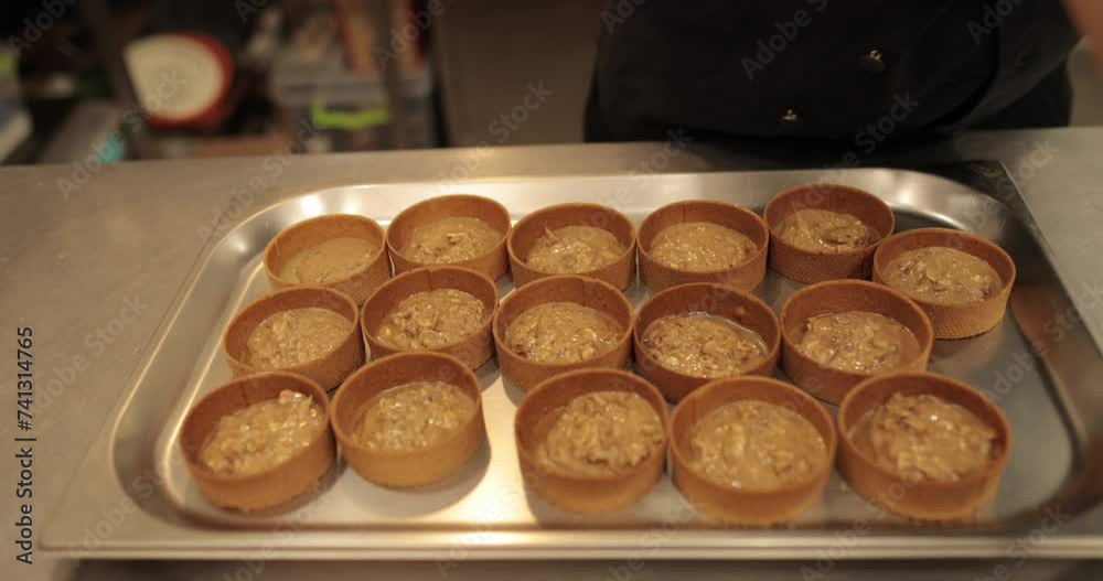 Homemade baking, making tarts at home. The process of filling tarts. Homemade baking, making tarts at home. The process of filling tarts.