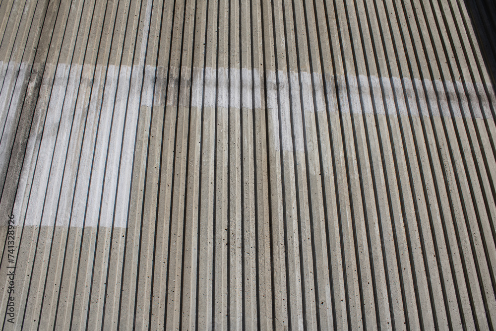 Textured wall with linear patterns Textured wall with linear patterns
