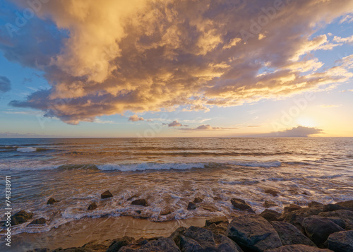 Gorgeous sunrise over Kekaha Beach, Island of Kauai, Hawaii photo