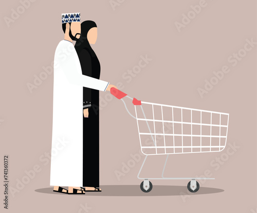 Omani Arabic family shopping and pushing cart