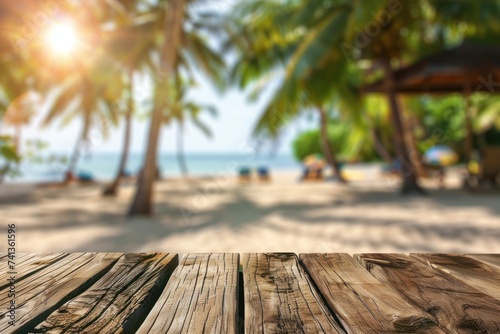 Empty wooden table and blurred beach background 