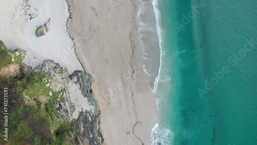 Aerial view of Lantic Bay, Cornwall, United Kingdom. photo