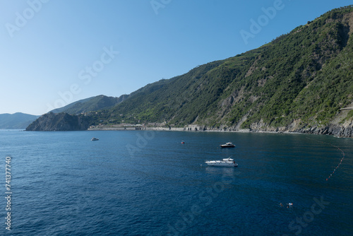 Italian shores with boats and cliffs in Cinque Terre
