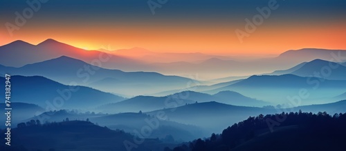 Mountains in the morning or evening with fog and forest. Sunrise and sunset