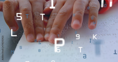 Image of letters over hands reading braille