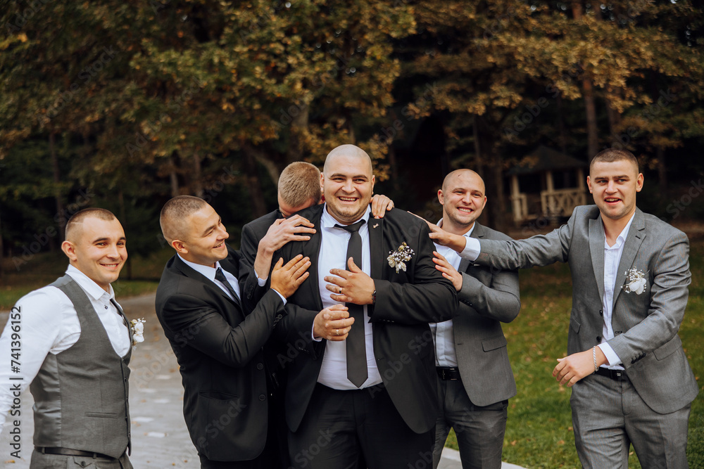 Wedding photography. The groom and his friends