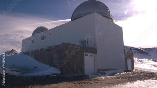 Telescope observatory on the snowy mountain in Sierra Nevada