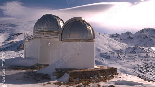 Telescope observatory on the snowy mountain in Sierra Nevada