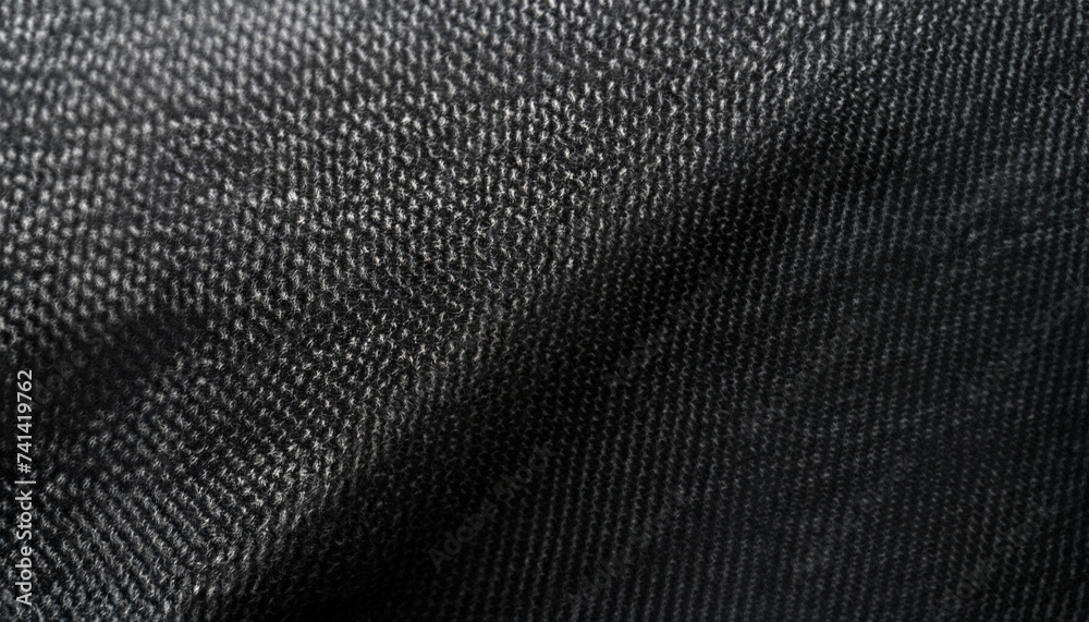 close-up on detail of Black fabric abstract background concept; soft and selective focus